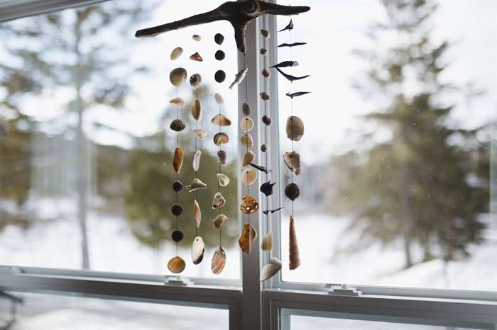 Beautiful seashell mobile in a window