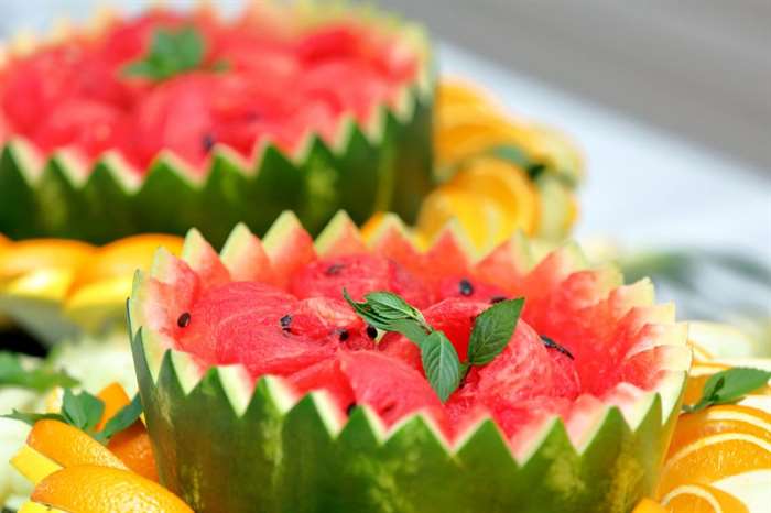 Fresh ripe watermelon in a hollow shell for a Birthday party.