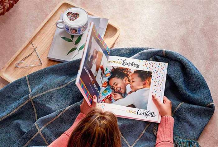 girl looking through custom high quality photo book