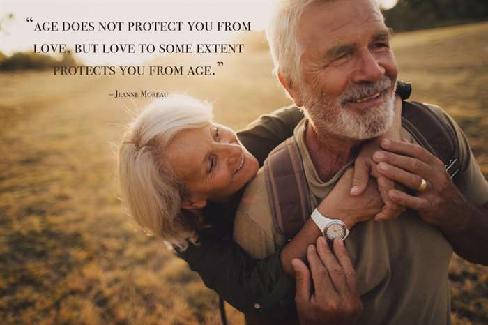 an elderly couple, still very much in love, with a love quote