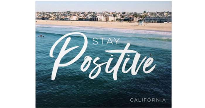 Premium poster print with a beach photo along with a quote that says stay positive
