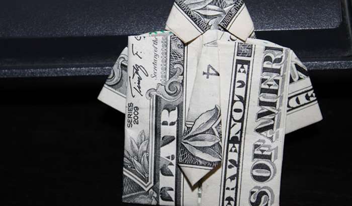 Dollar bill folded into shirt and tie