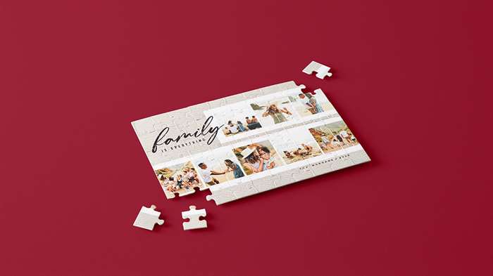 Custom family photo puzzle with big pieces and photo collage that says family in script writing