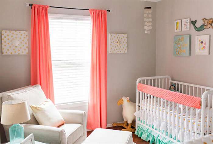 Pink mermaid nursery theme.