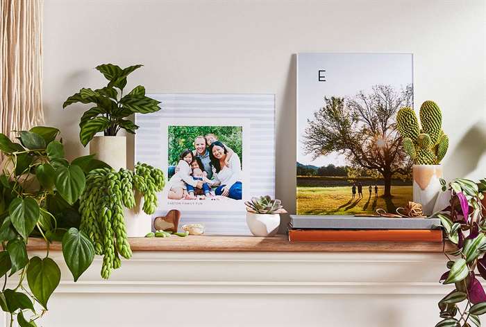 Photo prints on mantel.