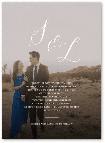 Modern Minimalist wedding invitation with couple posing in the background