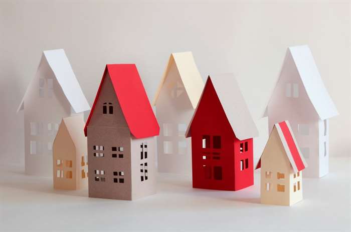 Houses from paper and a color cardboard as a Christmas craft idea.