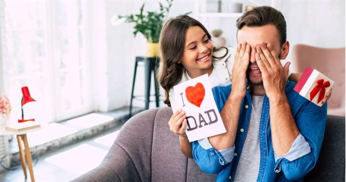 Dad and daughter with christmas presents