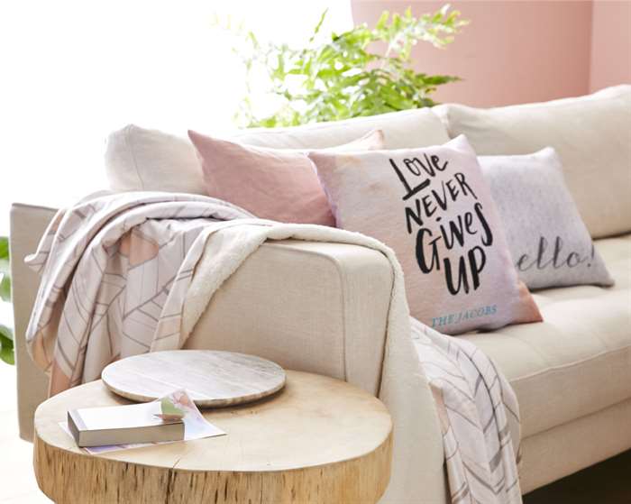 personalized pillow and blanket on couch