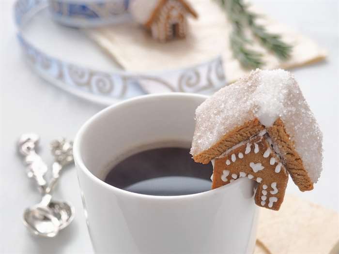 mini gingerbread house on top of mug