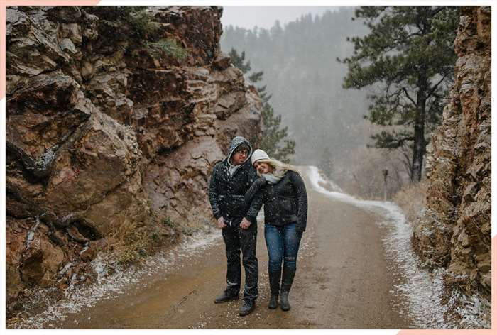 couple muddy rocky road christmas engagement photo