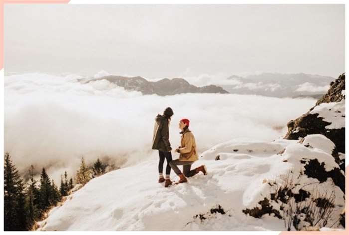 engagement on a mountain top christmas engagement photo