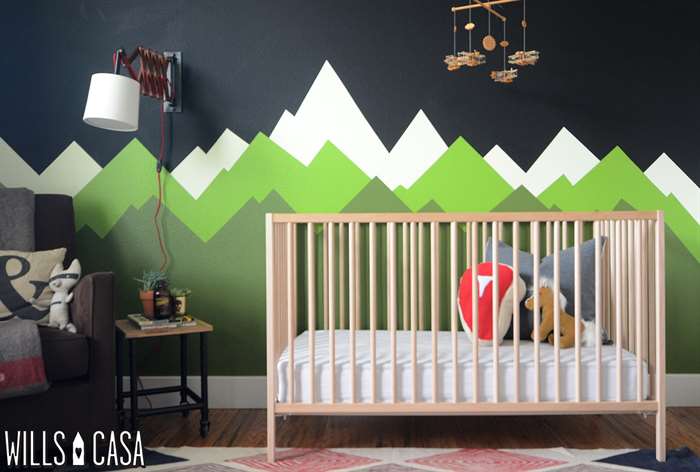 Mountain wall mural in baby nursery.