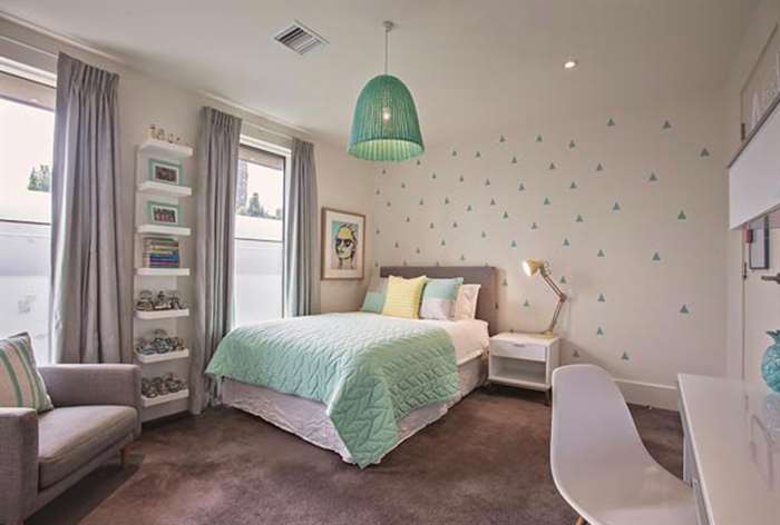 Teal and white bedroom decor.