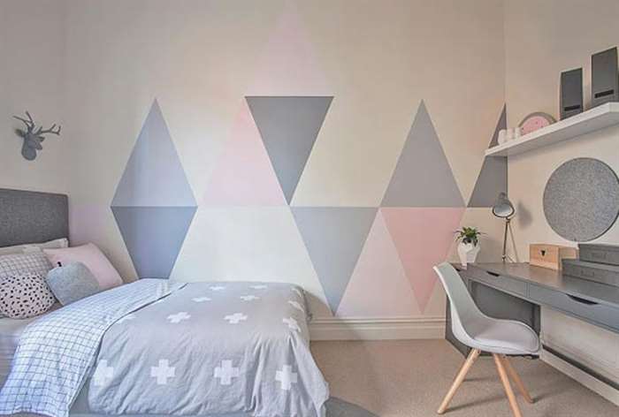 Gray and pink triangle wall decor.