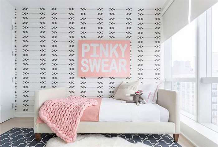 Pink and white girls bedroom decor.