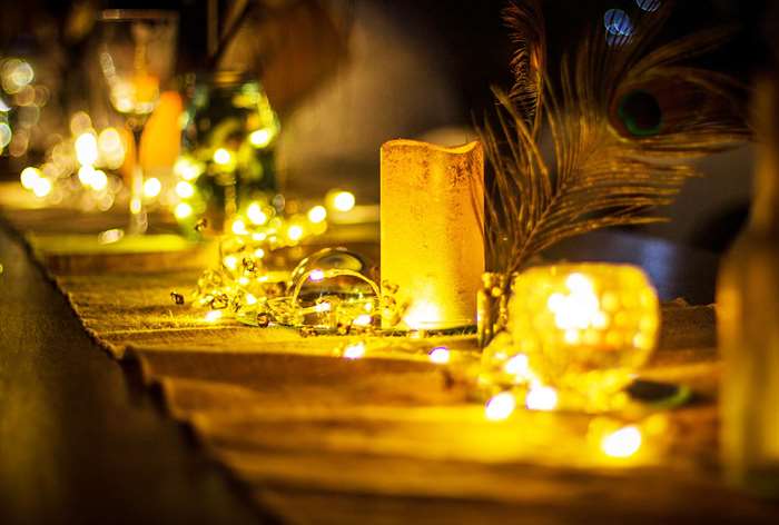 Table dimly lit with candles.