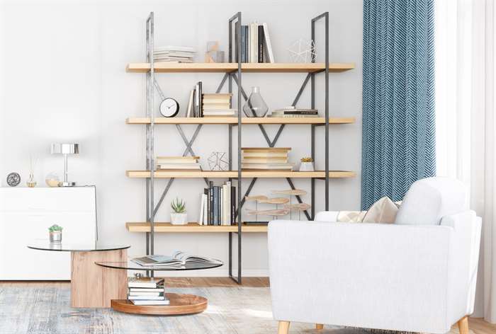 White living room with industrial shelves.