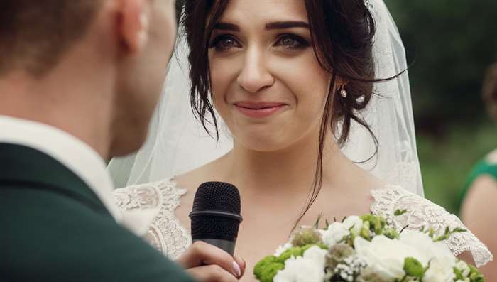 couple exchanging vows.