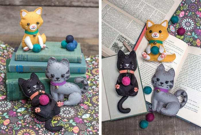 three cat figurines made out of felt