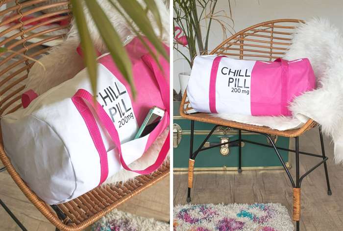 white and pink gym bag that says chill pill