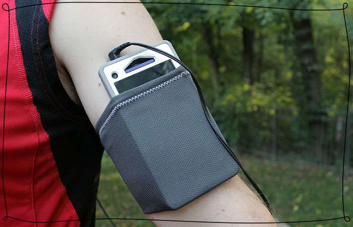 man wears running arm band