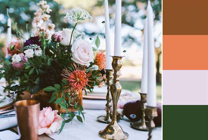 gold candlesticks on table