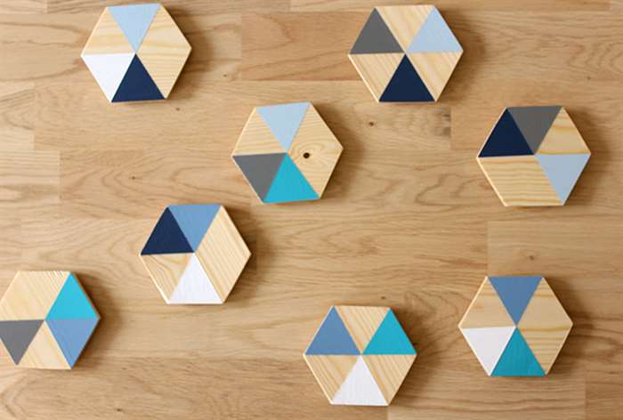 hexagon shaped wood coasters with blue geometric design