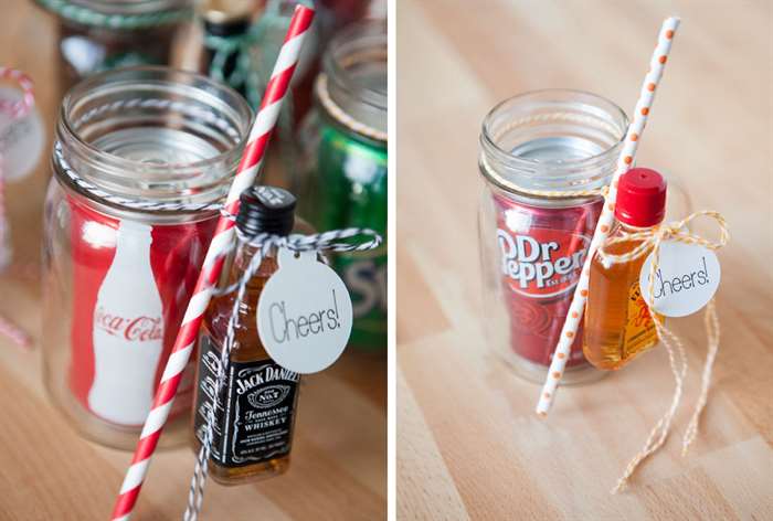 mini whiskey and coke bottles in a mason jar