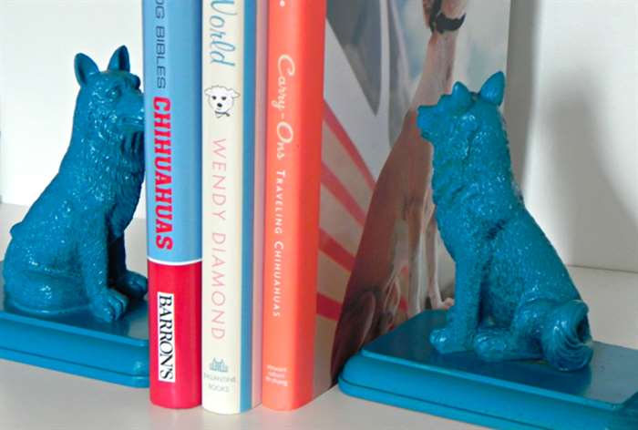 blue painted dog bookends