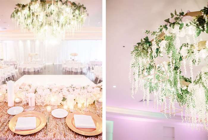 Gold and white sweetheart table with white flowers