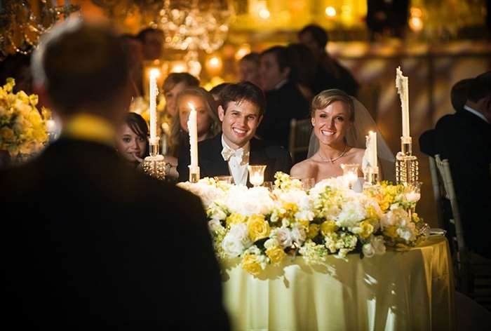 Yellow tablecloth with white and yellow flowers