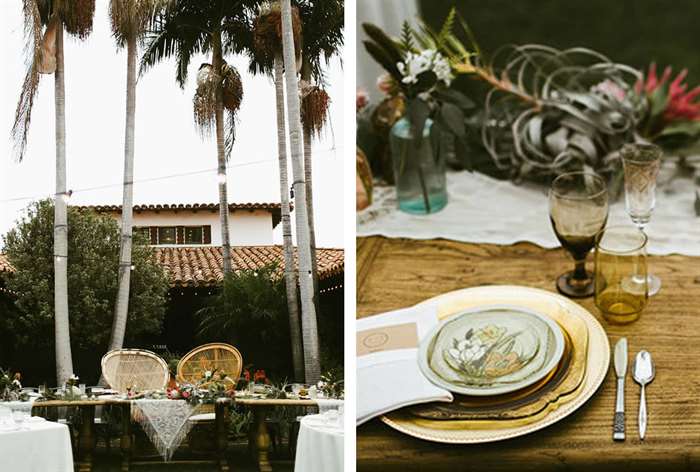 Tropical sweetheart table with wicker chairs