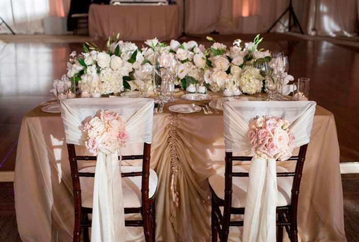 Neutral ruched tablecloth with white and blush flowers