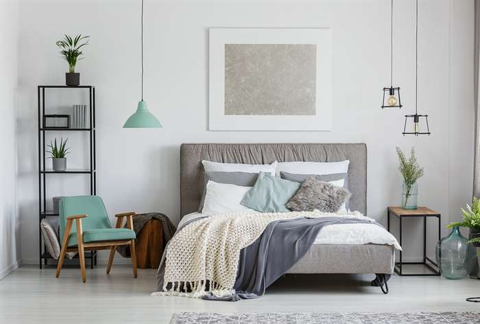 Gray bed frame. 