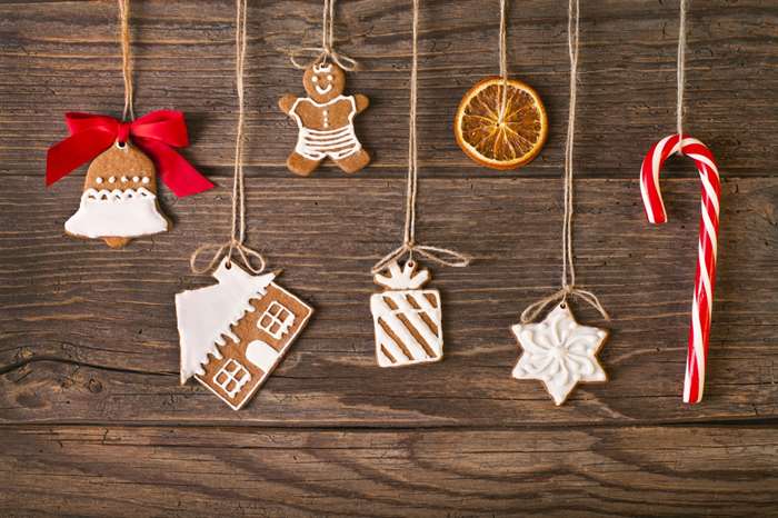 Christmas gingerbread cookies on wood background. 