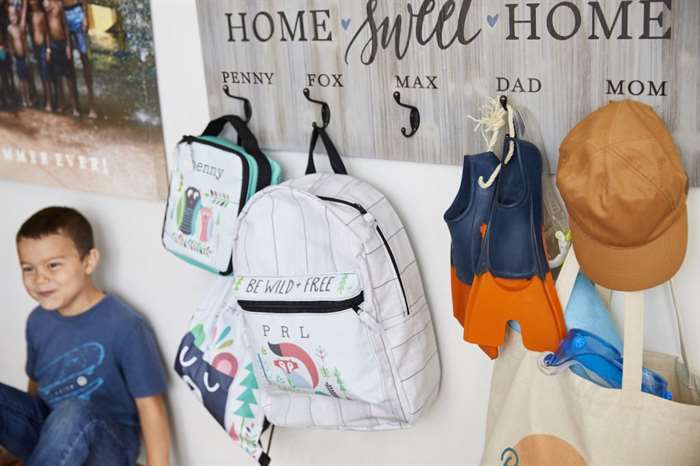 School gear organization with a wall hook organizer.