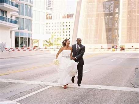 Bride and groom running with their personal style.