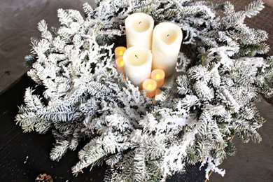Wreath-Covered Candles Christmas Centerpiece