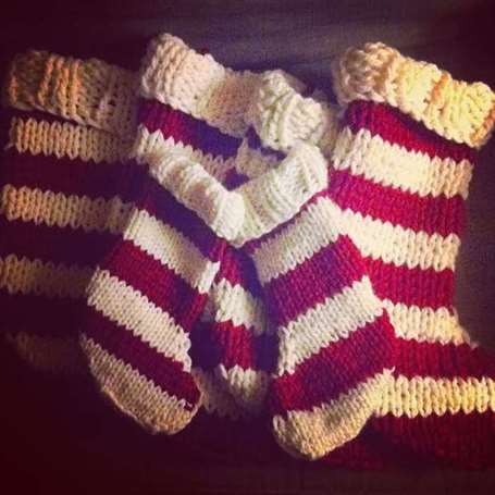 Red and white knit christmas stockings 