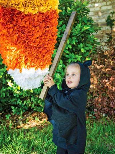 original_Sam-Henderson-Halloween-handmade-candy-ngô-pinata-beauty-with-kid.jpg.rend.hgtvcom.616.822