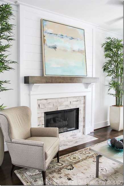 Watercolor print fireplace mantle decor idea