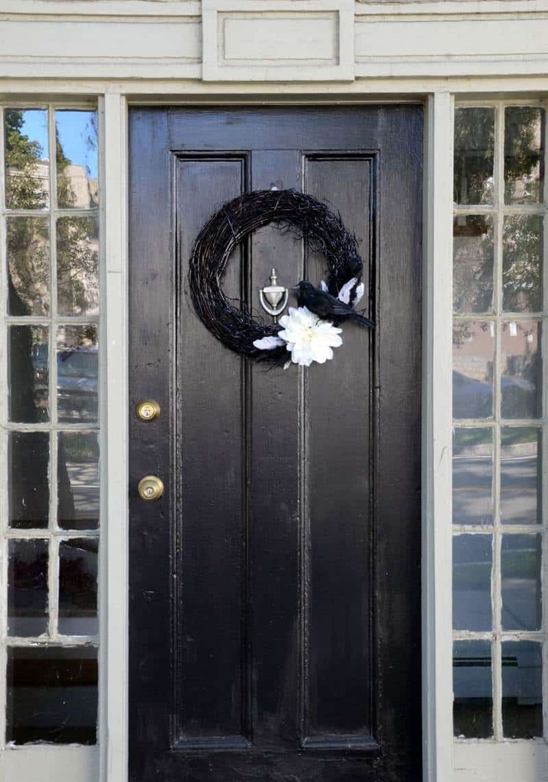 black front door halloween wreath.jpg