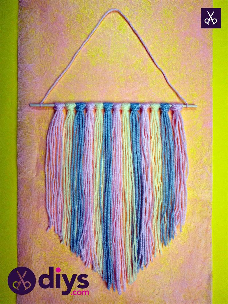 how to make a yarn wall hanging.jpg