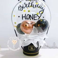 hop qua bong bong mau den sang trong